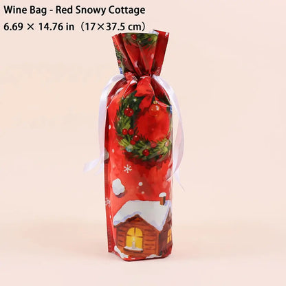 A festive red wine bag with a printed 'Red Snowy Cottage' design, featuring a green wreath, snowflakes, and a small snowy cabin. The bag is tied with a white ribbon and is shown against a solid pale pink background with a text overlay at the top detailing its dimensions.