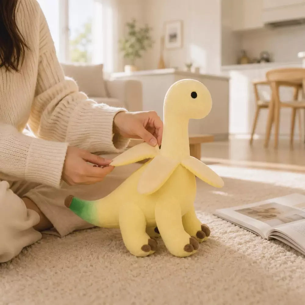 Cute banana dinosaur stuffed animal with an adorable cartoon design