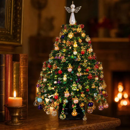 Finished beaded Christmas tree displayed as a festive tabletop decoration