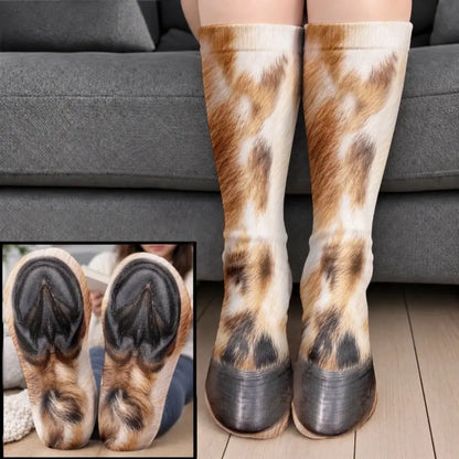 Brown and white horse fur hoof socks worn on legs before a gray sofa with a sole closeup
