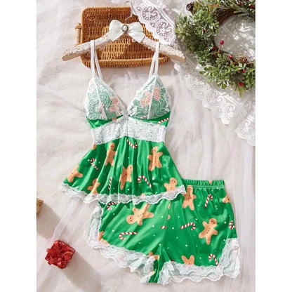 Green women's pajama set with gingerbread and candy cane print