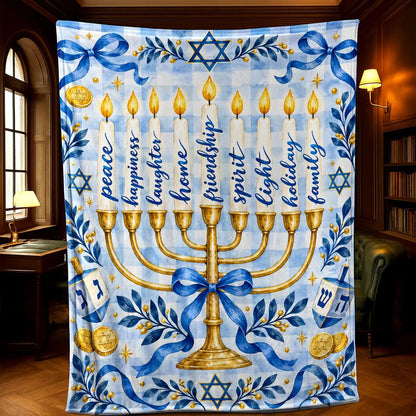 The blue and white gingham Hanukkah blanket with a golden menorah is displayed in a vintage styled living room