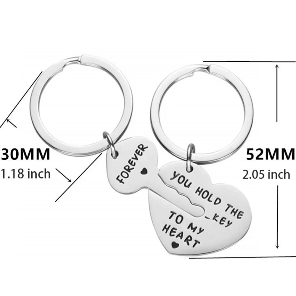 Two silver heart-shaped key rings with engraved text, shown with dimension lines and measurements labeled 30MM/1.18 inch and 52MM/2.05 inch