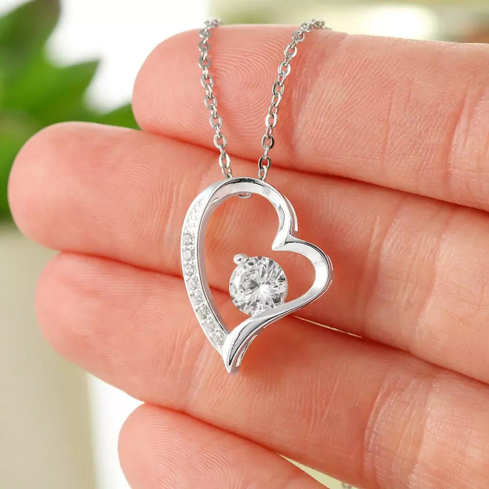 Close-up of the I Love You Mom heart necklace