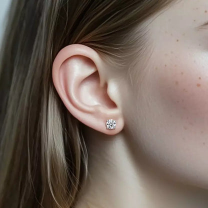 Solitaire moissanite stud earring shown on the ear