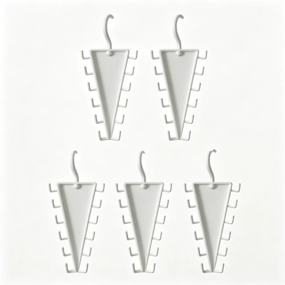 Five white plastic cone-shaped jewelry display stands with hook hangers, arranged on a plain white background.