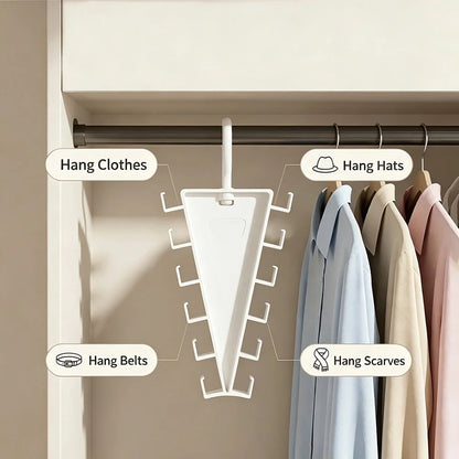 A white triangular hanging organizer rack shown inside a closet, with labeled callouts for hanging clothes, hats, belts, and scarves. Several garments are hanging on the right side.