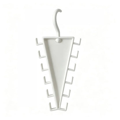 A white plastic umbrella stand with a hook at the top and multiple side slots, shown against a plain white background.
